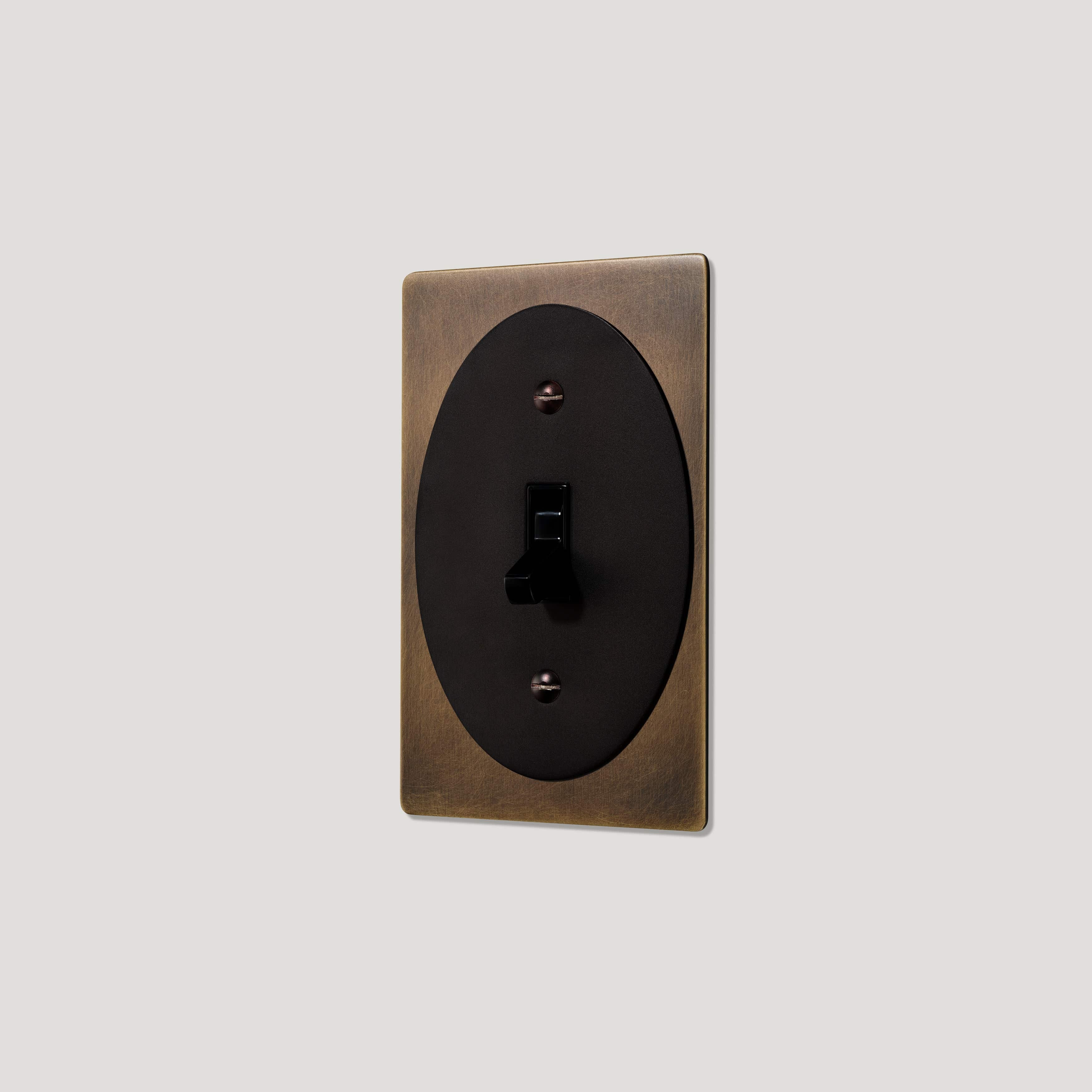 Plank Hardware JASPER 1G Oval Toggle Switch - Antique Brass / Blackened Bronze