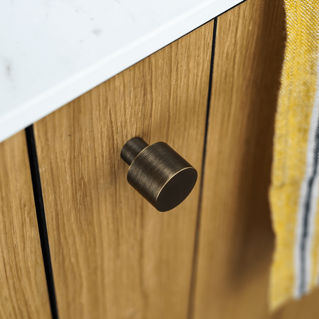 Plank Hardware MAXWELL Button Cabinet Knob - Antique Brass