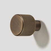Plank Hardware REVILL Knurled Button Wall Hook - Antique Brass